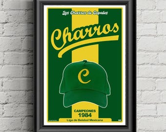 May include: Framed print featuring a green baseball cap with a yellow "C" and the word "Charros" in yellow script. The background is green and yellow with text that reads "Campeones 1984" and "Liga de Beisbol Mexicana".
