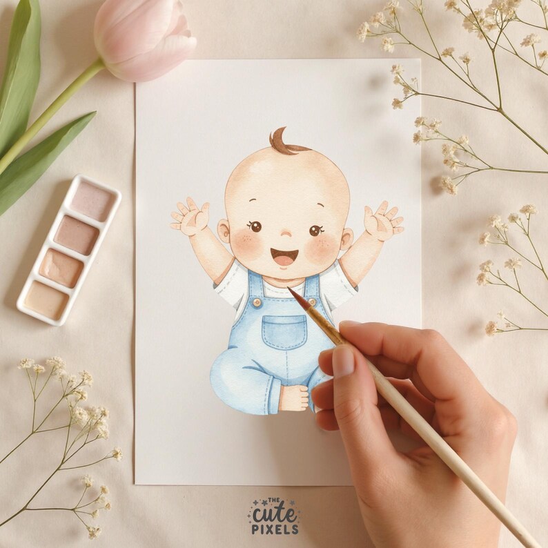 May include: Watercolor illustration of a smiling baby in blue overalls, with arms raised. The baby has brown hair and rosy cheeks. A paintbrush is held near the image. The text "the cute pixels" is at the bottom.