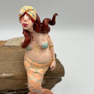 Ornella, small handmade mermaid edge stool made of modeling clay