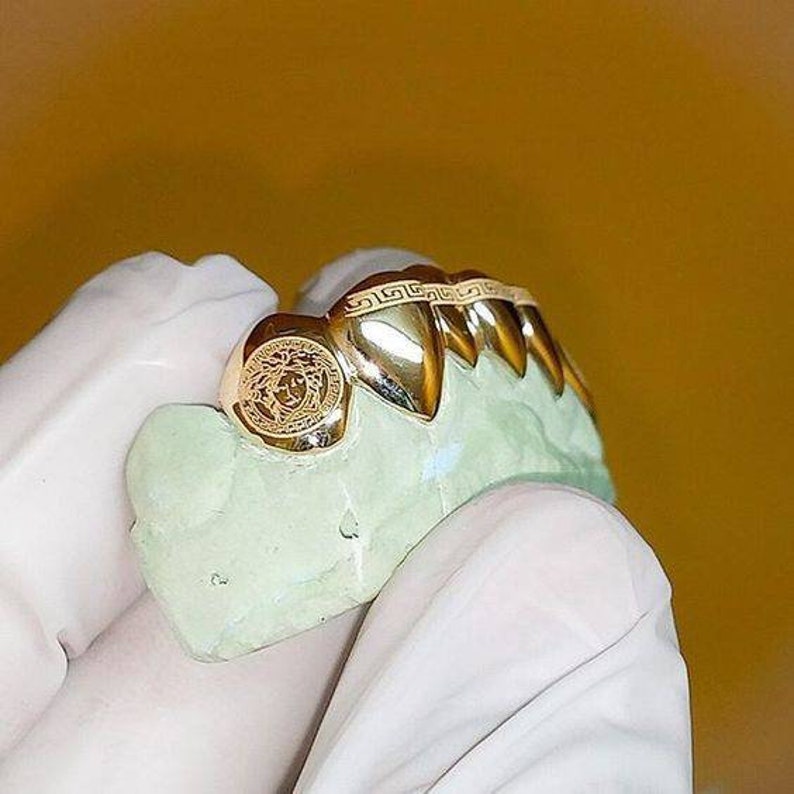 925 silver - 10K - 18K by Grillzstation Custom Grillz Versace bar and medusa face fangs