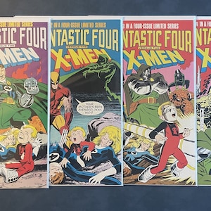 Vintage Fantastic Four vs X-Men Comic Books