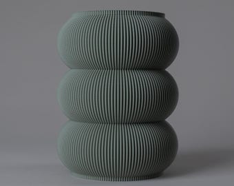 Weiche grüne Blumenvase EMMA - Gerippte Textur - Verspieltes Design - Wasserdichter Glaseinsatz - 3D-Druck aus 100% recyceltem Biokunststoff
