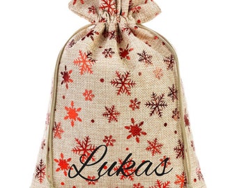 Borsa di Babbo Natale personalizzata con nome | Motivo con fiocchi di neve rossi glitterati | Borsa regalo di iuta per Natale con stampa del nome inclusa