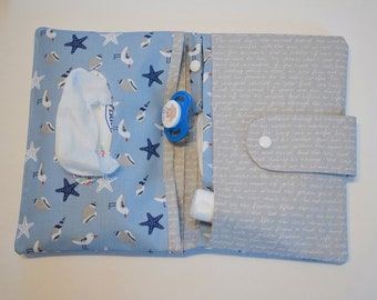 Diaper bag with four compartments, maritime pattern