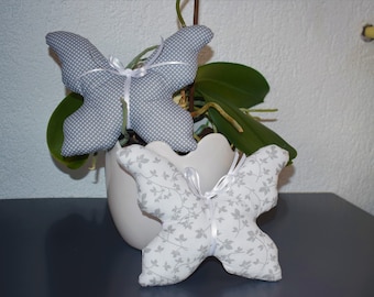 2 butterflies sewn from fabric, grey-white