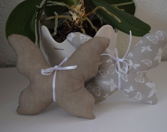 2 butterflies sewn from fabric, taupe-white