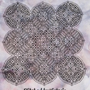 May include: Black and white geometric cross stitch pattern with a repeating design of circles and squares. The pattern is stitched on a white fabric with a subtle purple and pink ombre effect. The text "Stitched by Victoria" is at the bottom of the image.