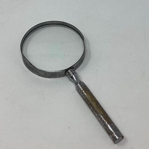Vintage silver metal magnifying glass