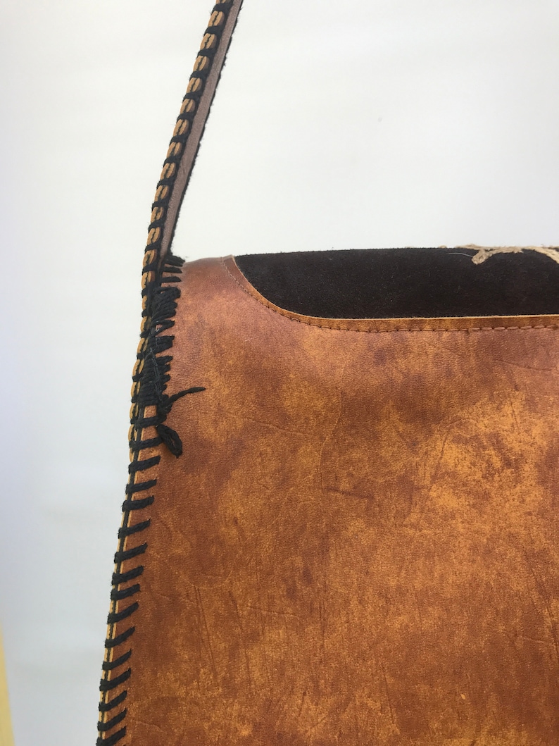 Vintage hand tooled leather bag with bird design