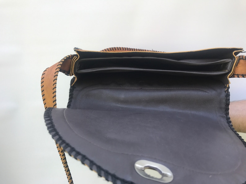 Vintage hand tooled leather bag with bird design