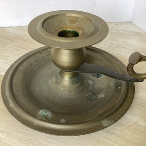 Vintage brass candlestick holder with patina