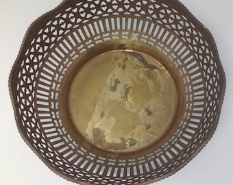 Vintage brass bowl with cut out designs