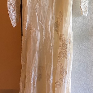 Vintage lace wedding dress with long sleeves