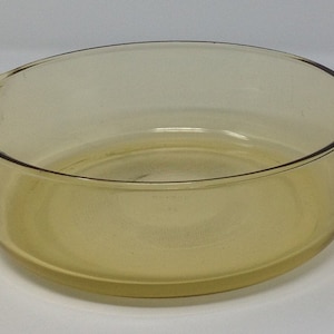 Vintage round yellow glass casserole dish