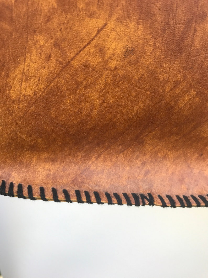 Vintage hand tooled leather bag with bird design
