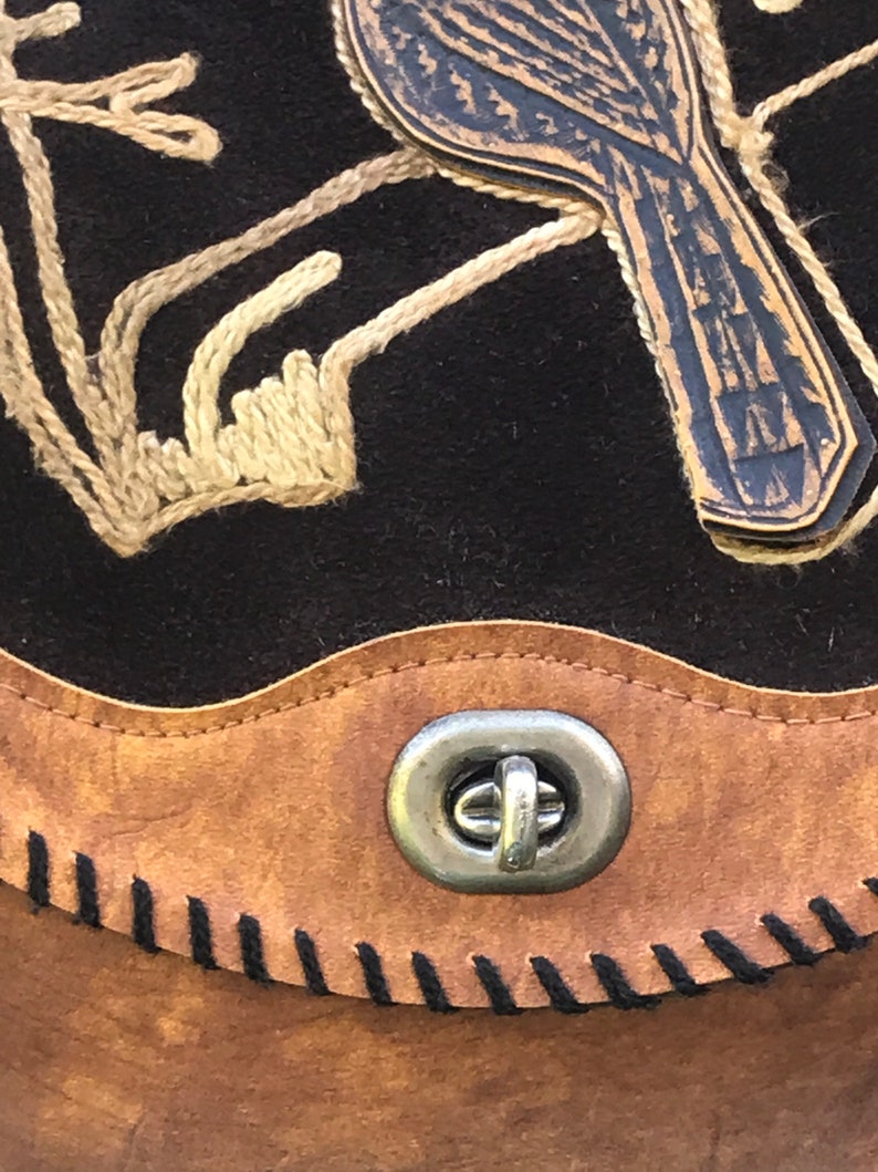 Vintage hand tooled leather bag with bird design
