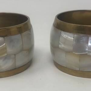 Vintage brass and shell napkin rings