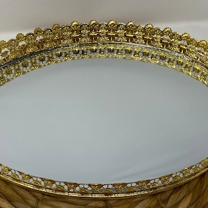 Vintage oval gold-tone floral edged, mirrored vanity tray