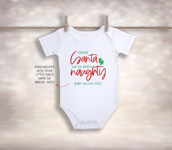 We've Been Naughty Funny Christmas Baby Pregnancy Reveal T-Shirt We've Been Naughty Funny Christmas Baby Pregnancy Reveal T-Shirt