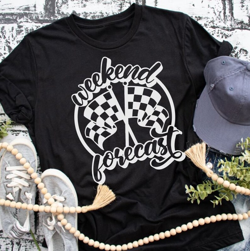 May include: Black t-shirt with a white graphic design of chequered flags and the text "weekend forecast".
