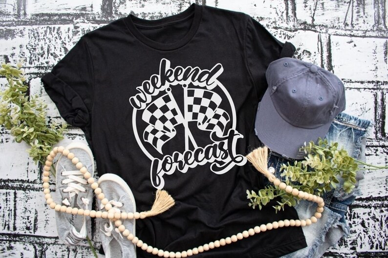 May include: Black t-shirt with white text that reads "Weekend Forecast" and a graphic of two chequered flags.