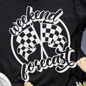 May include: Black and white graphic design on a black t-shirt with the text "weekend forecast" and two chequered flags.