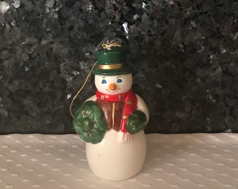 Snowman Holding a Wreath Ornament