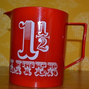 Vintage Liter Measure Red 70s. Retro Vintage Mid Century Used Interior