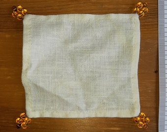 Cover cloth for drinking glass, linen + glass beads in amber color, hand sewn