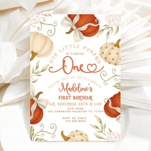 Fall-themed 1st birthday pumpkin digital invite with watercolor pumpkins, bows, and florals in blush, ivory, and burnt orange, displayed on a printed card and matching iPhone mockup.