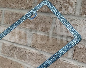 Cornice portatarga sottile e spessa color blu lago con strass