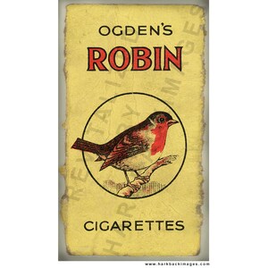 May include: Vintage cigarette pack with a yellow background and the text "OGDEN'S ROBIN CIGARETTES." A detailed illustration of a robin with red breast and brown wings is inside a black circle. The pack has a distressed, aged appearance.