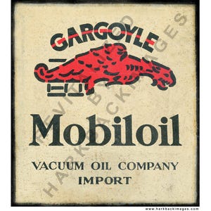 May include: Vintage Mobil Oil advertisement featuring a red gargoyle illustration above the word "Mobiloil." The text "Vacuum Oil Company" and "Import" are also displayed on the aged, cream-colored background, framed by a black border.