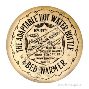 May include: Circular, off-white antique hot water bottle and bed warmer. The text reads "The Adaptable Hot Water Bottle & Bed Warmer" with additional text indicating it was made at The Old Fulham Pottery, Estd. 1671. The image has a vintage aesthetic.
