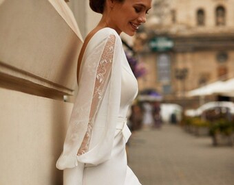 Sheer long sleeves crepe  minimalistic modest wedding dress with boat neckline and open back