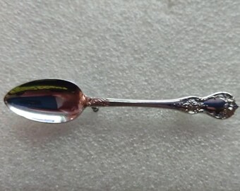 1930s-1950s-era silver-tone spoon brooch