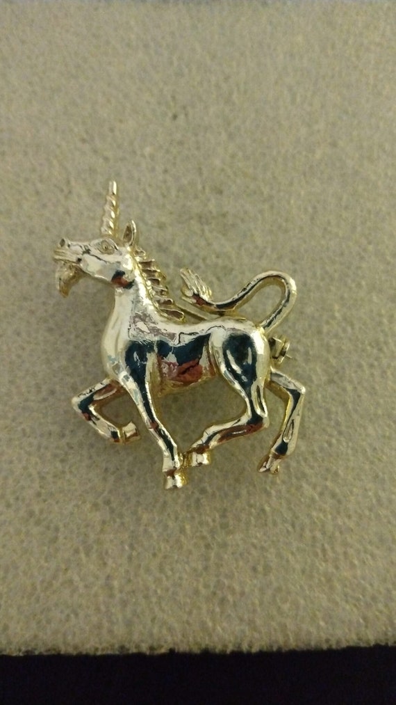 Gerry's gold-tone unicorn brooch