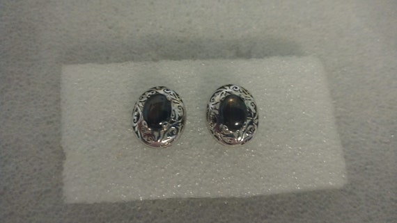 Black mother-of-pearl stud earrings - image 1