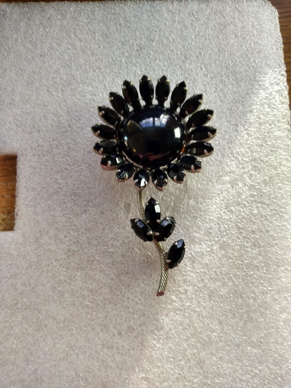 Regency brand black glass flower brooch