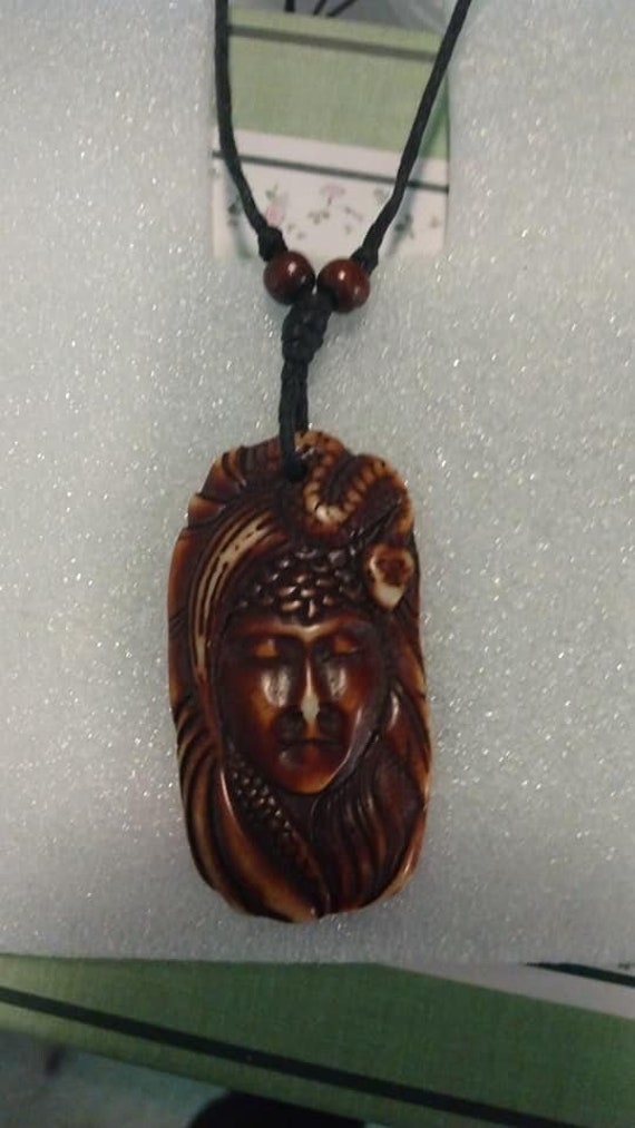 Carved bone serpent woman pendant necklace