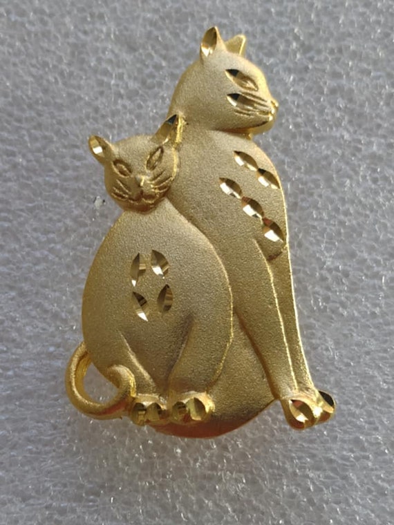 Torino gold-tone cats brooch