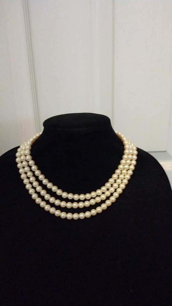 1928 brand three-strand faux pearl necklace