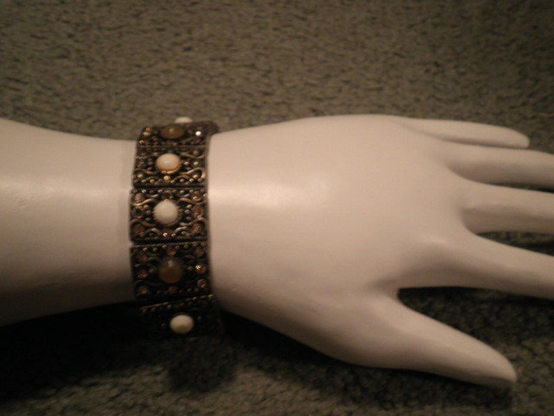 Monet stretch bronze tone bracelet