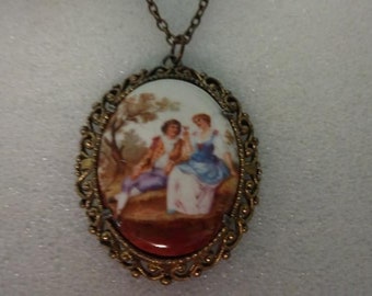 Rococo-style courting couple porcelain pendant necklace