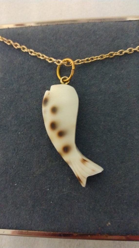 Cowrie shell sperm whale pendant necklace