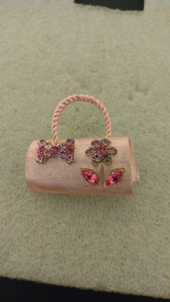 Pink purse brooch with rhinestones