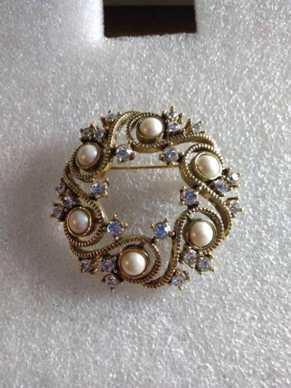 Monet circular gold tone clear rhinestone and faux