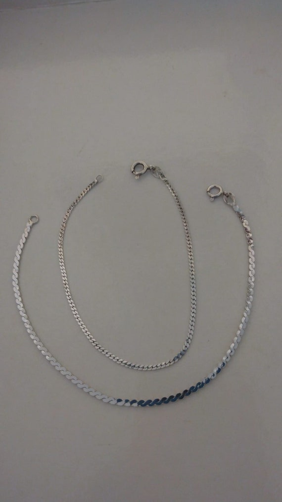 Two fine sterling silver chain bracelets