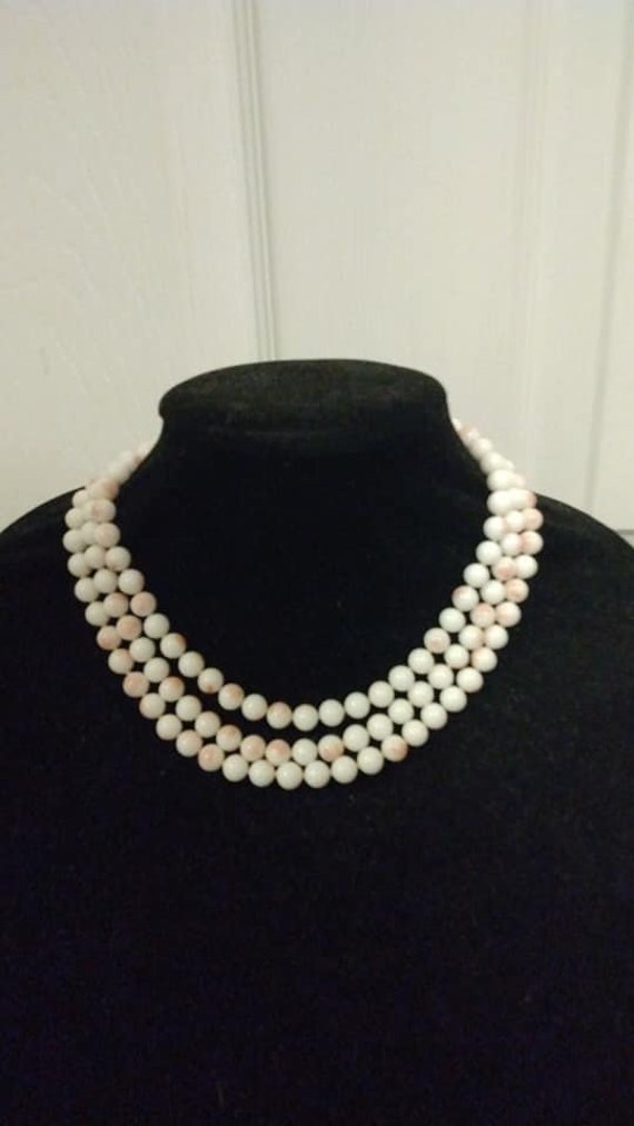 Hand-crafted Judith Green three-strand white and p