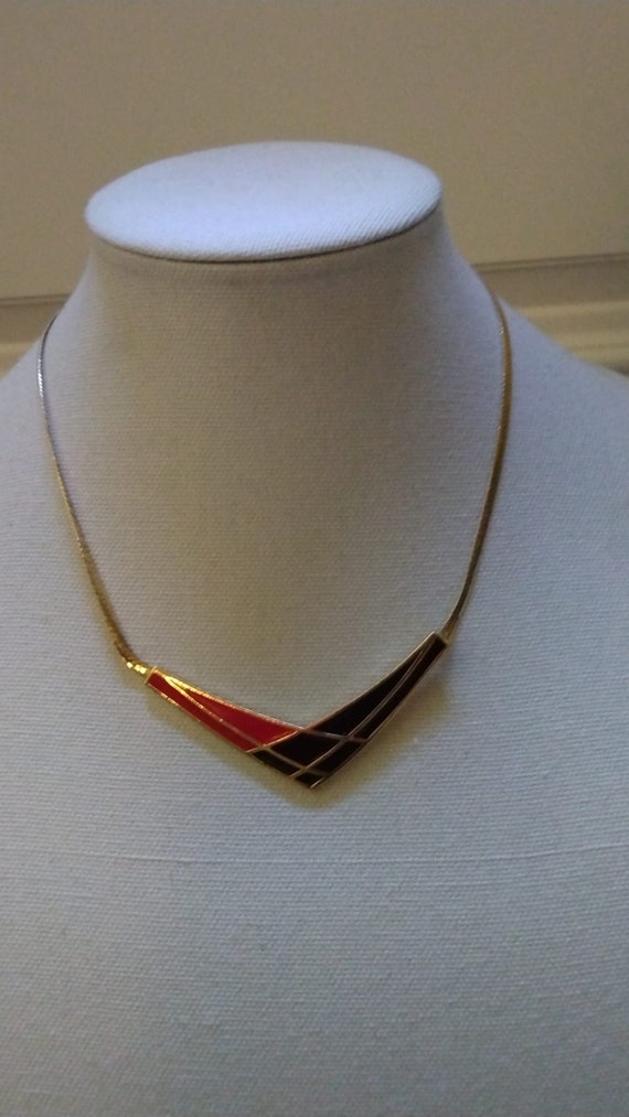 Avon 1986 "Color Splash" black and red enamel neck